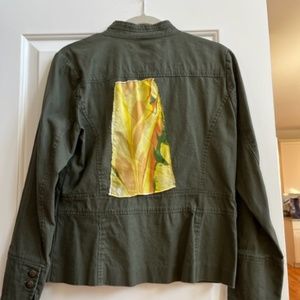 Green jean jacket with a silk marbled on the back.